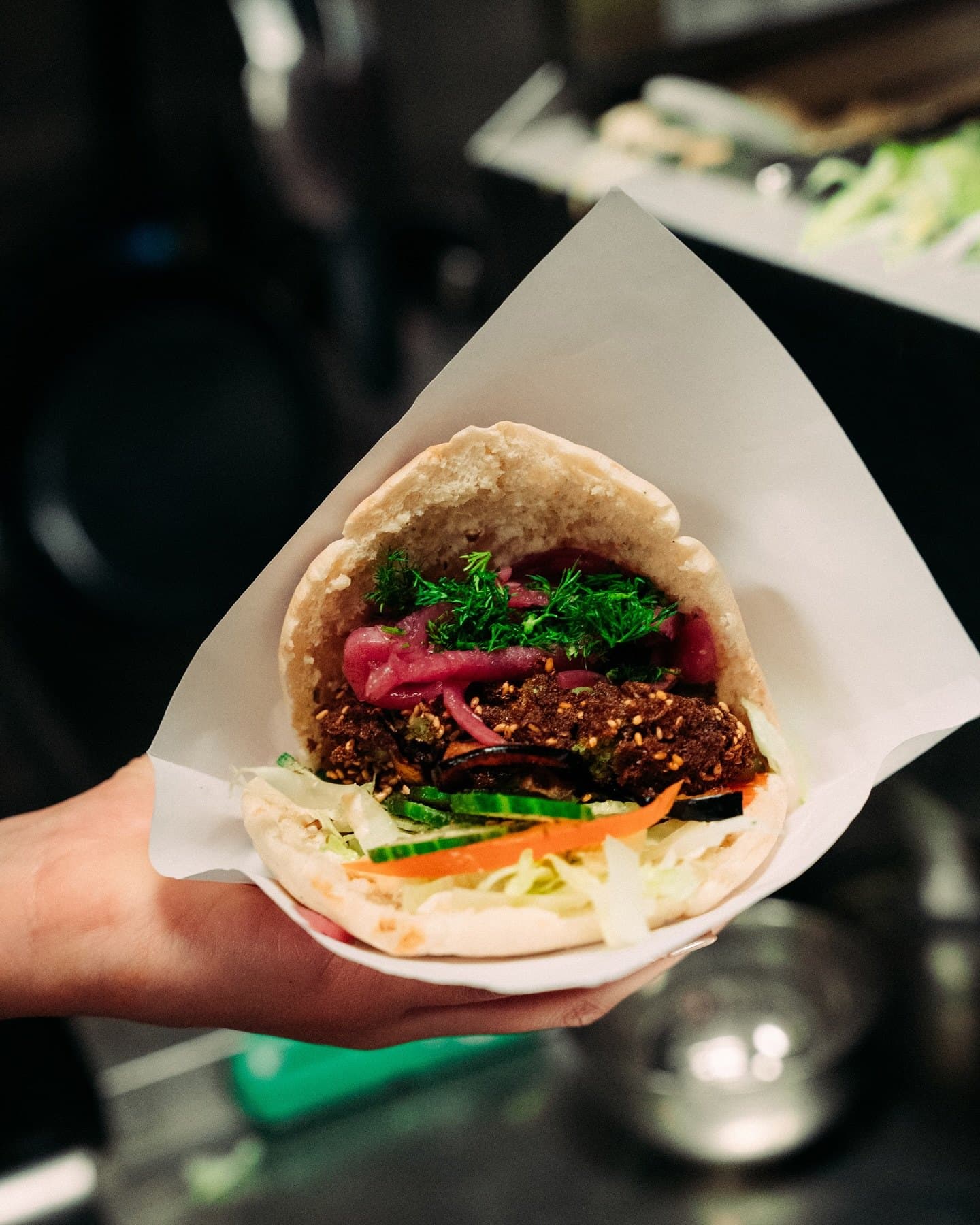 A pita sandwich on a plate