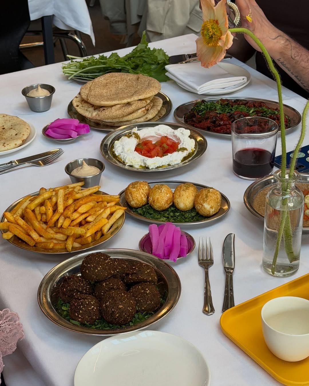 Egyptian breakfast plates with dips and bread